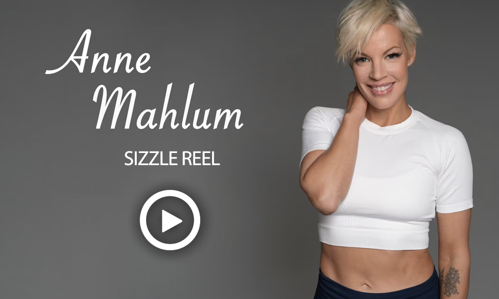 anne-sizzle Anne Mahlum sizzle reel image of a smiling woman in workout gear.